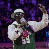 Flavor Flav Sings The National Anthem at Milwaukee Bucks Home Game