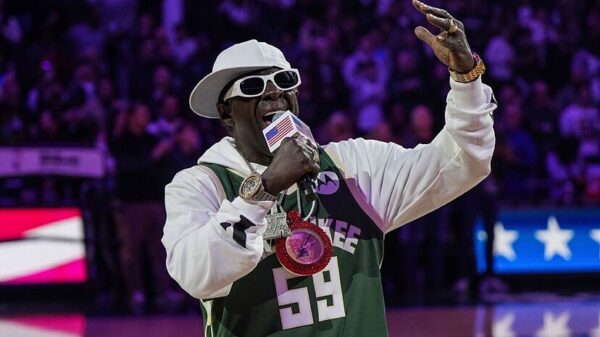 Flavor Flav Sings The National Anthem at Milwaukee Bucks Home Game